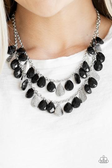 Life of the FIESTA - Black - Paparazzi Accessories -   Two strands of silver chain are decorated in a flirtatious fringe of faceted black teardrops. Glittery beveled silver teardrops are sprinkled between the black beading, adding hints of shimmer to the vibrant design. Features an adjustable clasp closure.  Sold as one individual necklace. Includes one pair of matching earrings.