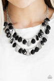 Life of the FIESTA - Black - Paparazzi Accessories -   Two strands of silver chain are decorated in a flirtatious fringe of faceted black teardrops. Glittery beveled silver teardrops are sprinkled between the black beading, adding hints of shimmer to the vibrant design. Features an adjustable clasp closure.  Sold as one individual necklace. Includes one pair of matching earrings.