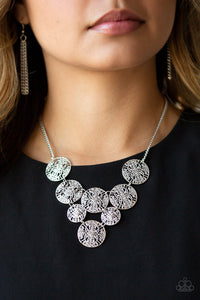 Malibu Idol - Silver - Paparazzi Accessories -  Filled with shiny mandala-like filigree, a cascade of glistening silver discs link below the collar for a whimsical statement-making fashion. Features an adjustable clasp closure.  Sold as one individual necklace. Includes one pair of matching earrings.  #P2WH-SVXX-312PB