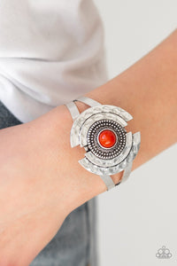 Incredibly Indie - Orange - Paparazzi Accessories -  A refreshing orange bead is pressed into the center of a hammered and studded silver floral frame atop an antiqued cuff for a seasonal look.  Sold as one individual bracelet.