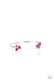 Going For Glitter - Pink - Paparazzi Accessories -  Item #P9DA-PKXX-066XX Varying in shape, glittery pink and white rhinestones join at both ends of a dainty silver cuff, creating refined fittings.  Sold as one individual bracelet.