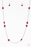 Pacific Piers - Red - Paparazzi Accessories -  Item #P2WH-RDXX-219XX Featuring round and teardrop shapes, rich red beading trickles along an elongated silver chain for a seasonal look. Features an adjustable clasp closure.  Sold as one individual necklace. Includes one pair of matching earrings.