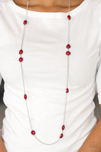 Pacific Piers - Red - Paparazzi Accessories -  Item #P2WH-RDXX-219XX Featuring round and teardrop shapes, rich red beading trickles along an elongated silver chain for a seasonal look. Features an adjustable clasp closure.  Sold as one individual necklace. Includes one pair of matching earrings.