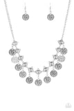 Walk The Plank - Silver - Paparazzi Accessories -  Item #P2TR-SVXX-104XX Coin-like discs swing from the bottoms of ornate silver frames, creating a boisterous fringe below the collar. Features an adjustable clasp closure.  Sold as one individual necklace. Includes one pair of matching earrings.