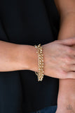 Cash Confidence - Gold - Paparazzi Accessories -  Item #P9RE-GDXX-170CC Dainty gold and crystal-like beads cascade from two shimmery gold chains. Infused with plain gold chains, the colorful strands layer around the wrist for a flirtatious look. Features an adjustable clasp closure.  Sold as one individual bracelet.