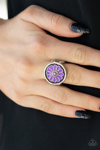 Garden View - Purple - Paparazzi Accessories -   Item #P4WH-PRXX-154XX Brushed in an antiqued shimmer, vivacious purple petals spin into a whimsical floral pattern atop the finger. Features a stretchy band for a flexible fit.  Sold as one individual ring.