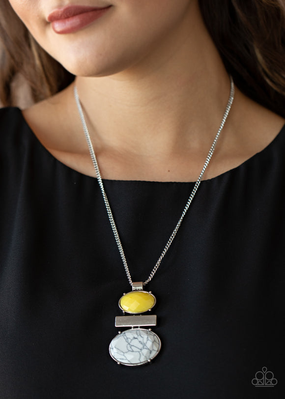 Finding Balance - Yellow - Paparazzi Accessories -  Item #P2SE-YWXX-169XX An oval yellow acrylic bead, shimmery silver rectangular frame, and white stone bead coalesce into a stacked pendant at the bottom of a shiny silver chain for a colorfully earthy look. Features an adjustable clasp closure.  Sold as one individual necklace. Includes one pair of matching earrings.  2021