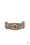 Daisy Paradise - Brass - Paparazzi Accessories -  Item #P9WH-BRXX-104XX The front of an asymmetrical brass cuff is stamped and embossed in lacy vines and a leafy floral pattern for a whimsical fashion.  Sold as one individual bracelet.