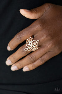 Walk The VINE - Rose Gold - Paparazzi Accessories -  Item #P4WH-GDRS-102XX Glistening rose gold filigree vines and loops across the finger, coalescing into an airy frame. Features a stretchy band for a flexible fit.  Sold as one individual ring.