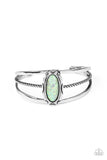 Stone Sahara - Multi - Paparazzi Accessories -   Item #P9SE-MTXX-134XX A glittery iridescent stone is pressed into a decorative silver frame atop a mismatched layered cuff, creating a seasonal sparkle around the wrist.  Sold as one individual bracelet.