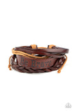 Brave Soul - Brown - Paparazzi Accessories -   Mismatched strands of brown twine and leather cords join a thick brown leather band stamped in the phrase, "Be Brave," around the wrist for a rustically layered look. Features an adjustable sliding knot closure.  Sold as one individual bracelet.