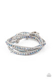 What Goes Around - Multi - Paparazzi Accessories -  Item #P9SE-MTXX-132XX .A dainty collection of iridescent crystal-like beads are delicately threaded between two strands of shiny gray cording, coalescing into a trendy double wrap bracelet around the wrist. Features an adjustable button loop closure.  Sold as one individual bracelet. LIFE OF THE PARTY (LOP)