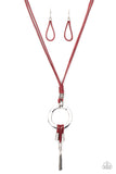 Tranquil Artisan - Red - Paparazzi Accessories -  Item #P2SE-RDXX-246XX Infused with bold silver beaded accents, pieces of Samba cording loop around the bottom of a hammered silver hoop, creating a colorful artisan inspired pendant at the knotted end of lengthened Samba cording. Features an adjustable clasp closure.  Sold as one individual necklace. Includes one pair of matching earrings.