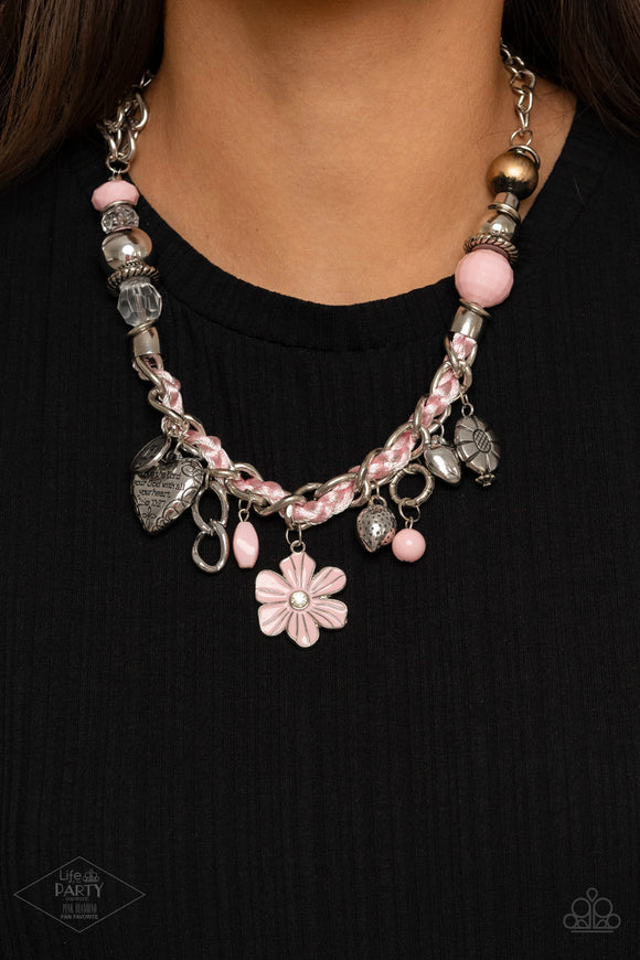 Charmed, I Am Sure - Pink - Paparazzi Accessories -  Item #P2WH-PKXX-412XX Pink cording is braided through a chunky silver chain. A unique variety of charms decorate the piece including a delicate flower and a heart inscribed with the phrase 