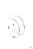 Chic As Can Be - Silver - Paparazzi Accessories -  Item #P5HO-SVXX-248XX Lined in linear detail, a classic silver hoop curls around the ear for a chic and casual look. Earring attaches to a standard post fitting. Hoop measures approximately 1 1/2" in diameter.  Sold as one pair of hoop earrings.