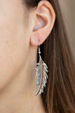 Fearless Flock - Brown - Paparazzi Accessories -  Item #P5RE-BNXX-100XX A row of dainty topaz rhinestones are encrusted down the spine of a lifelike silver feather, creating a refined frame. Earring attaches to a standard fishhook fitting.  Sold as one pair of earrings.