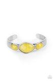 Next Stop, Olympus! - Yellow - Paparazzi Accessories -  Item #P9WH-YWXX-140YO Featuring faceted surfaces, an asymmetrical collection of cloudy Illuminating faux stone beads are pressed into the front of a silver cuff, creating a mystical centerpiece around the wrist.  Sold as one individual bracelet.