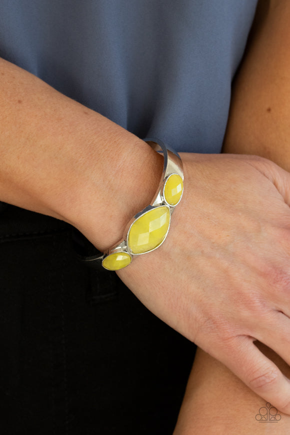 Next Stop, Olympus! - Yellow - Paparazzi Accessories -  Item #P9WH-YWXX-140YO Featuring faceted surfaces, an asymmetrical collection of cloudy Illuminating faux stone beads are pressed into the front of a silver cuff, creating a mystical centerpiece around the wrist.  Sold as one individual bracelet.