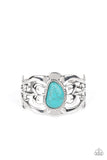 The MESAS are Calling - Blue - Paparazzi Accessories -  Item #P9SE-BLXX-336XX An asymmetrical turquoise stone is pressed into the center of a silver cuff layered with filigree patterns around the wrist for a rustic flair.  Sold as one individual bracelet.