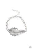 Rustic Roost - Silver - Paparazzi Accessories -  Item #P9SE-SVXX-095XX Etched and embossed in lifelike detail, a rustic silver feather centerpiece attaches to an antiqued silver chain around the wrist. Features an adjustable clasp closure.  Sold as one individual bracelet.