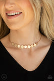 Dont Get Bent Out Of Shape - Gold - Paparazzi Accessories  Item #P2CH-GDXX-065XX Featuring shimmery scratched surfaces, a dainty collection of flat round and square gold frames adorn the front of a gold snake chain around the neck for a minimalist inspired look. Features an adjustable clasp closure.  Sold as one individual choker necklace. Includes one pair of matching earrings.