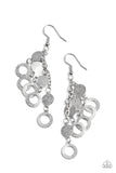 Im Always BRIGHT - Silver - Paparazzi Accessories -  Item #P5RE-SVXX-294XX Hammered in a high sheen shimmer, dainty silver discs and rings cascade from the ear, creating a blinding tassel. Earring attaches to a standard fishhook fitting.  Sold as one pair of earrings.