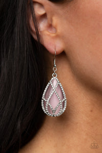 Crawling With Couture - Pink - Paparazzi Accessories -   Item #P5RE-PKXX-213XX White rhinestone encrusted silver bars crisscross into a glittering beveled teardrop that delicately overlaps an oversized pink teardrop cat's eye stone, creating a luminously layered lure. Earring attaches to a standard fishhook fitting.  Sold as one pair of earrings.