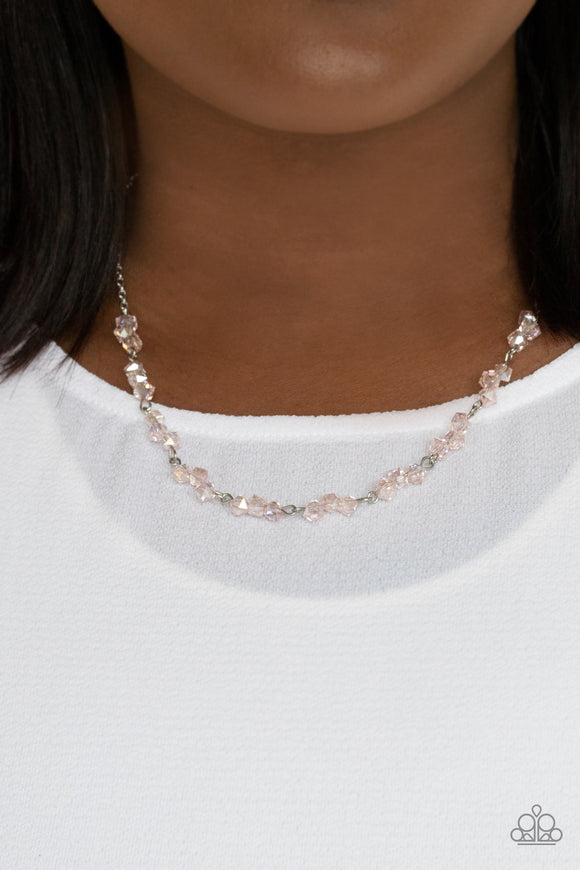 Incredibly Iridescent - Pink - Paparazzi Accessories -  Item #P2RE-PKXX-298XX Attached to a dainty silver chain, trios of pink iridescent crystal-like beads are delicately threaded along silver rods below the collar for a timelessly twinkly look. Features an adjustable clasp closure.  Sold as one individual necklace. Includes one pair of matching earrings.