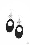 Retro Reveal - Black - Paparazzi Accessories -  Item #P5SE-BKXX-216XX An airy black wooden oval frame swings from the bottom of a hammered silver frame, creating a retro lure. Earring attaches to a standard fishhook fitting.  Sold as one pair of earrings.