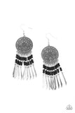 Sun Warrior - Black - Paparazzi Accessories -  Item #P5SE-BKXX-228XX Silver and black beaded tassels swing from the bottom of an oversized silver disc embossed in an antiqued sunburst. Flared silver bars attach to the bottoms of the beaded tassels, creating an edgy fringe. Earring attaches to a standard fishhook fitting.  Sold as one pair of earrings.