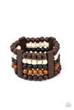 Caribbean Catwalk - Multi - Paparazzi Accessories -   Item #P9SE-MTXX-157XX Held in place by rectangular wooden frames, strands of brown, black, and white wooden beads are threaded along stretchy bands around the wrist for a colorfully tropical look.  Sold as one individual bracelet.