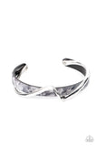 Craveable Curves - Silver - Paparazzi Accessories -  Item #P9BA-SVXX-120XX A flat silver bar delicately curls across a dainty gray shell-like acrylic cuff, creating a whimsical centerpiece around the wrist.  Sold as one individual bracelet.