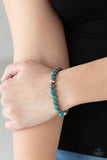 Awakened - Blue - Paparazzi Accessories -   Item #P9UR-BLXX-173XX Swirling with blue, green, and brown details, earthy beads and faceted silver accents are threaded along a stretchy band around the wrist for a tranquil look.  Sold as one individual bracelet.