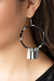 Garden Chimes - Black - Paparazzi Accessories -   Item #P5SE-BKXX-240XX Flared rectangular silver plates swing from the bottom of a hoop wrapped in black, white, and yellow floral fabric, creating a whimsical fringe. Earring attaches to a standard fishhook fitting.  Sold as one pair of earrings.