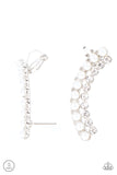 Doubled Down On Dazzle - White - Paparazzi Accessories -   Item #P5PO-CRWT-267XX Featuring classic silver fittings, two rows of dainty white pearls and glassy white rhinestones arch into a timeless statement piece. Earring attaches to a standard post earring. Features a clip-on fitting at the top for a secure fit.  Sold as one pair of ear crawlers.