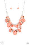 Spring Goddess - Orange - Paparazzi Accessories -  Item #P2ST-OGXX-080ZZ What better way to say "hello spring" than with this vibrant stunner? Double the fun with two layers of beads, baubles, stone, and wood in varying tones and finishes in the Pantone® of Burnt Coral, intermixed with sparkling, wavy silver discs gently swaying from a silver chain. Features an adjustable clasp closure.  Sold as one individual necklace. Includes one pair of matching earrings.  2021 APRIL FASHION FIX