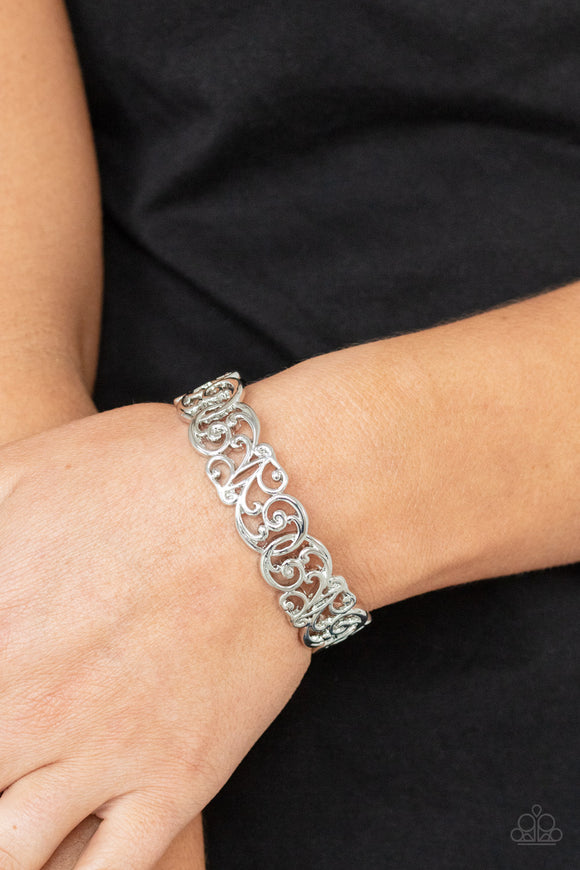 Wild Vineyards - Silver - Paparazzi Accessories -  Item #P9WH-SVXX-227XX Brushed in a high sheen shimmer, vine-like silver filigree delicately curls around the wrist, creating a vintage inspired cuff.  Sold as one individual bracelet.