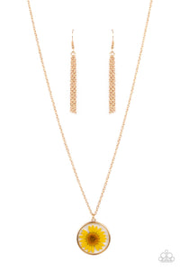 Prairie Promenade - Yellow - Paparazzi Accessories -  Item #P2DA-YWXX-059XX A yellow daisy is encased inside a glassy casing, creating a whimsical floral pendant beneath the collar. Features an adjustable clasp closure.  Sold as one individual necklace. Includes one pair of matching earrings.