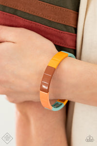 Material Movement - Multi - Paparazzi Accessories -  Item #P9SE-MTXX-163ZX Metal rectangles painted in the spring Pantone® shades of Cerulean, Rust, Marigold, and Burnt Coral are threaded along stretchy bands, forming a gorgeous spectrum of color that wraps around the wrist.  Sold as one individual bracelet.  2021 APRIL FASHION FIX