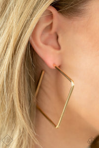 Material Girl Magic - Gold - Paparazzi Accessories -  Item #P5HO-GDXX-196ZX A deceptively simple square frame is tilted on point to create a geometric hoop. Its sharp angles are complemented by its rich gold finish, making a lasting impression. Earring attaches to a standard post fitting. Hoop measures approximately 2" in diameter.  Sold as one pair of hoop earrings.  2021 APRIL FASHION FIX