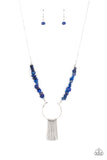 With Your ART and Soul - Blue - Paparazzi Accessories -  Item #P2SE-BLXX-460XX Dainty silver rods swing from the bottom of a bowing silver fitting that attaches to sections of lapis pebbles at the bottom of a silver chain, creating a whimsically seasonal display. Features an adjustable clasp closure.  Sold as one individual necklace. Includes one pair of matching earrings.