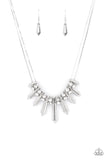 Dangerous Dazzle - White - Paparazzi Accessories -  Item #P2ED-WTXX-042XX Pairs of glittery white rhinestones alternate between flared silver rods that are threaded along two rows of flat silver chains, creating a dangerous fringe below the collar. Features an adjustable clasp closure.  Sold as one individual necklace. Includes one pair of matching earrings.