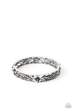 Hawaiian Essence - Silver - Paparazzi Accessories -  Item #P9WH-SVXX-219XX Filled with leafy tropical floral filigree, two antiqued silver frames connect into a whimsical bangle-like cuff around the wrist. Features a hinged closure.  Sold as one individual bracelet.