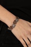 Rustic Heartthrob - Multi - Paparazzi Accessories -  Item #P9WH-MTXX-121XX Adorned in dainty floral accents, hammered copper and silver heart frames and classic silver beads are threaded along stretchy bands around the wrist for a romantically rustic look.  Sold as one individual bracelet.