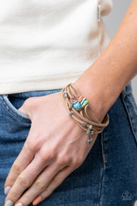 Canyon Flight - Multi - Paparazzi Accessories -  Item #P9SE-URMT-207XX Infused with a dainty silver bird charm, dainty strands of brown suede are adorned in mismatched silver accents and multicolored stones for a colorfully layered look. Features an adjustable clasp closure.  Sold as one individual bracelet.