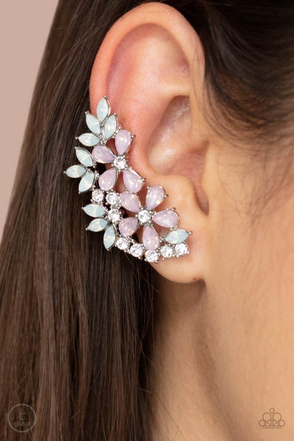 Garden Party Powerhouse - Pink - Paparazzi Accessories -   Item #P5PO-CRPK-070XX Featuring a milky opalescence, white marquise and pink teardrop rhinestones coalesce into a sparkly floral centerpiece that flawlessly climbs the ear. Earring attaches to a standard post fitting. Features a dainty cuff attached to the top for a secure fit.  Sold as one pair of ear crawlers.