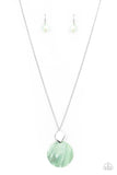 Tidal Tease - Green - Paparazzi Accessories -   Item #P2SE-GRXX-216XX Featuring a glistening iridescence, an Green Ash shell-like disc attaches to a shiny silver frame at the bottom of a lengthened silver chain, creating a summery pendant. Features an adjustable clasp closure.  Sold as one individual necklace. Includes one pair of matching earrings.