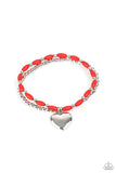 Candy Gram - Red  - Paparazzi Accessories -  Item #P9WH-RDXX-159XX A shiny silver heart dangles from a strand of fiery red beads. It is paired with a strand of round silver beads threaded along a stretchy band for a whimsical display around the wrist.  Sold as one pair of bracelets.