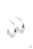 Modern Meltdown​ - Silver - Paparazzi Accessories -   Item #P5HO-SVXX-267XX Featuring a high-sheen, a chunky silver hoop is melted and molded into a bold, modern design. Earring attaches to a standard post fitting. Hoop measures approximately 1" in diameter.  Sold as one pair of hoop earrings.