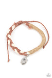 Perpetually Peaceful - Brown - Paparazzi Accessories -  Item #P9UR-BNXX-565XX Featuring a blooming dandelion, a simple silver disc is stamped in the word, "Peace," creating a whimsical charm on a homespun bracelet. Braided brown and white twine is balanced with wrapped brown twine for a natural feel encircling the wrist. Features an adjustable sliding knot closure.  Sold as one individual bracelet.